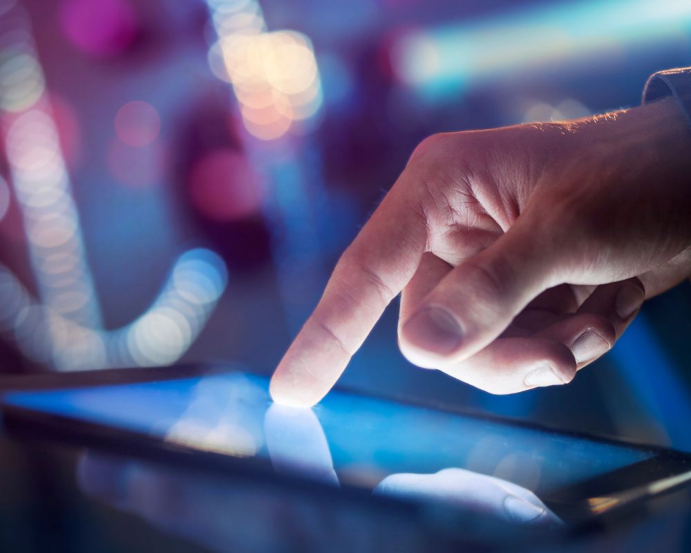 A person using a digital sales room on a tablet